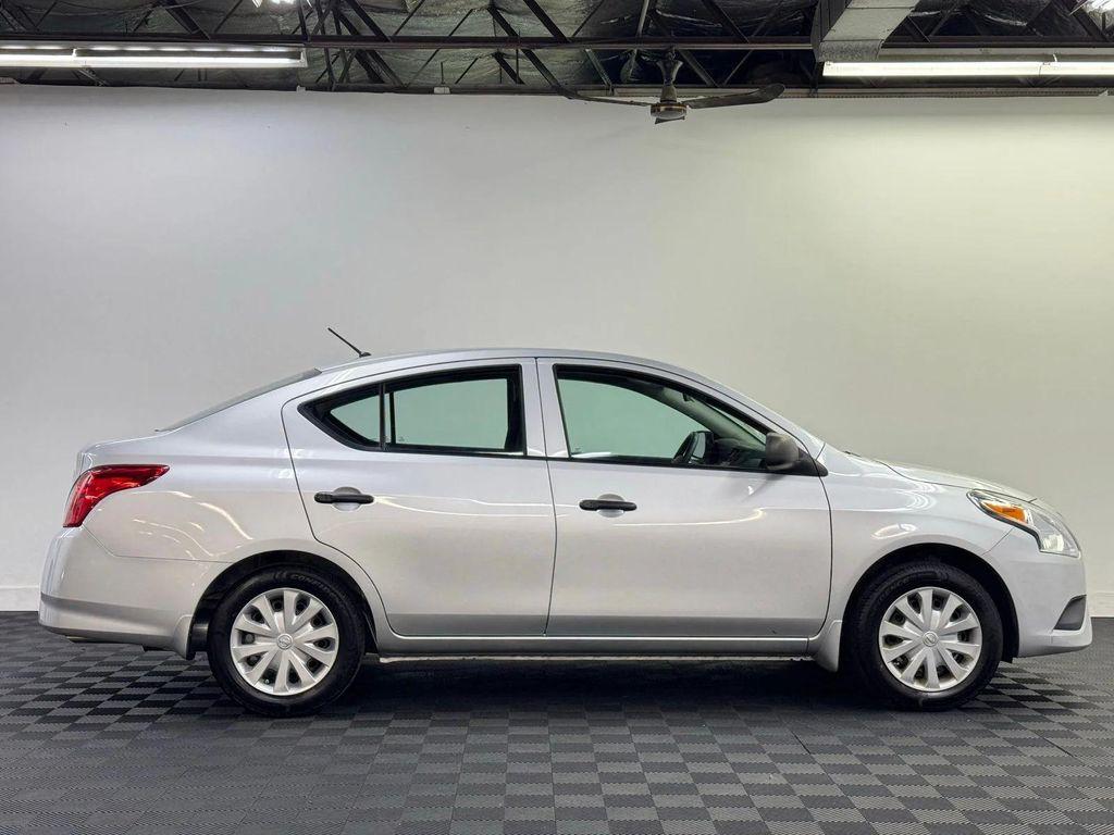 used 2015 Nissan Versa car, priced at $10,000