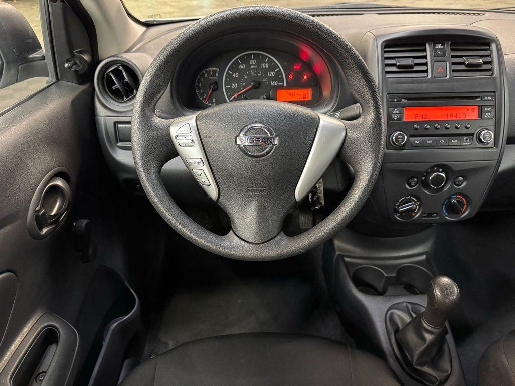 used 2015 Nissan Versa car, priced at $10,000