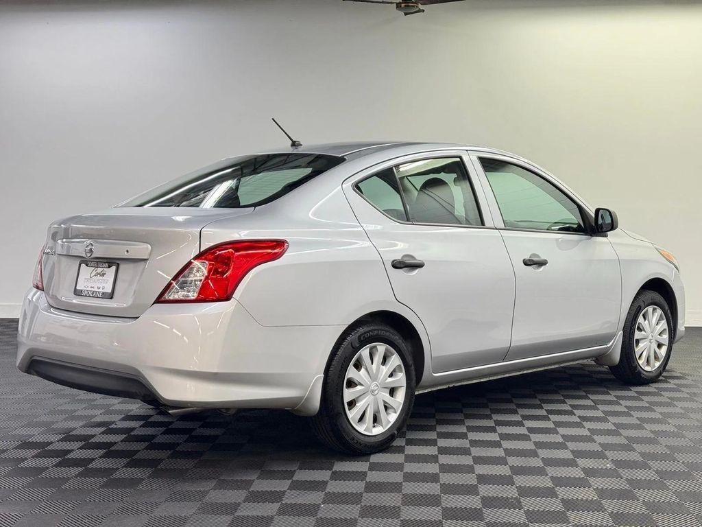 used 2015 Nissan Versa car, priced at $10,000