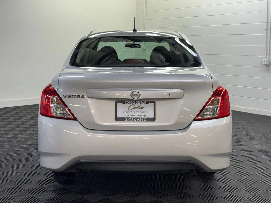 used 2015 Nissan Versa car, priced at $10,000
