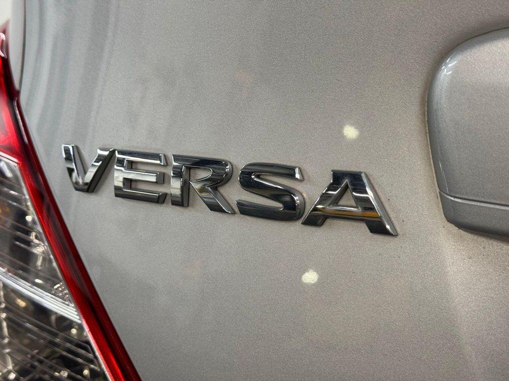 used 2015 Nissan Versa car, priced at $10,000