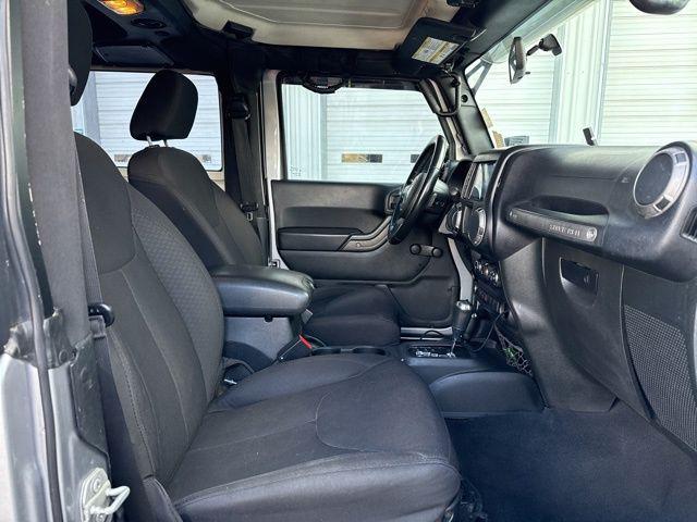 used 2015 Jeep Wrangler car, priced at $14,000