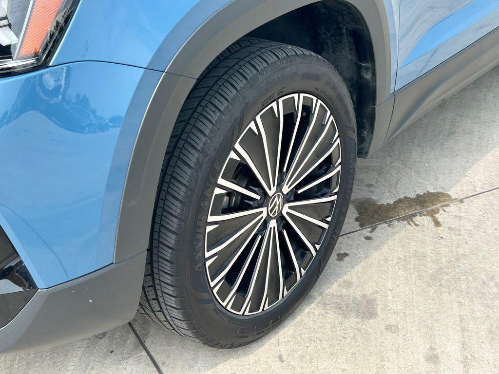used 2025 Volkswagen Taos car, priced at $23,391