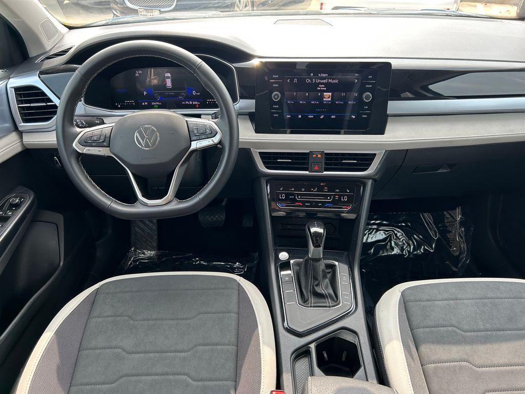 used 2025 Volkswagen Taos car, priced at $23,391