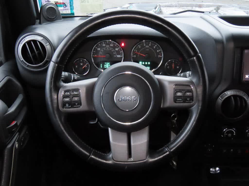 used 2013 Jeep Wrangler Unlimited car, priced at $12,995