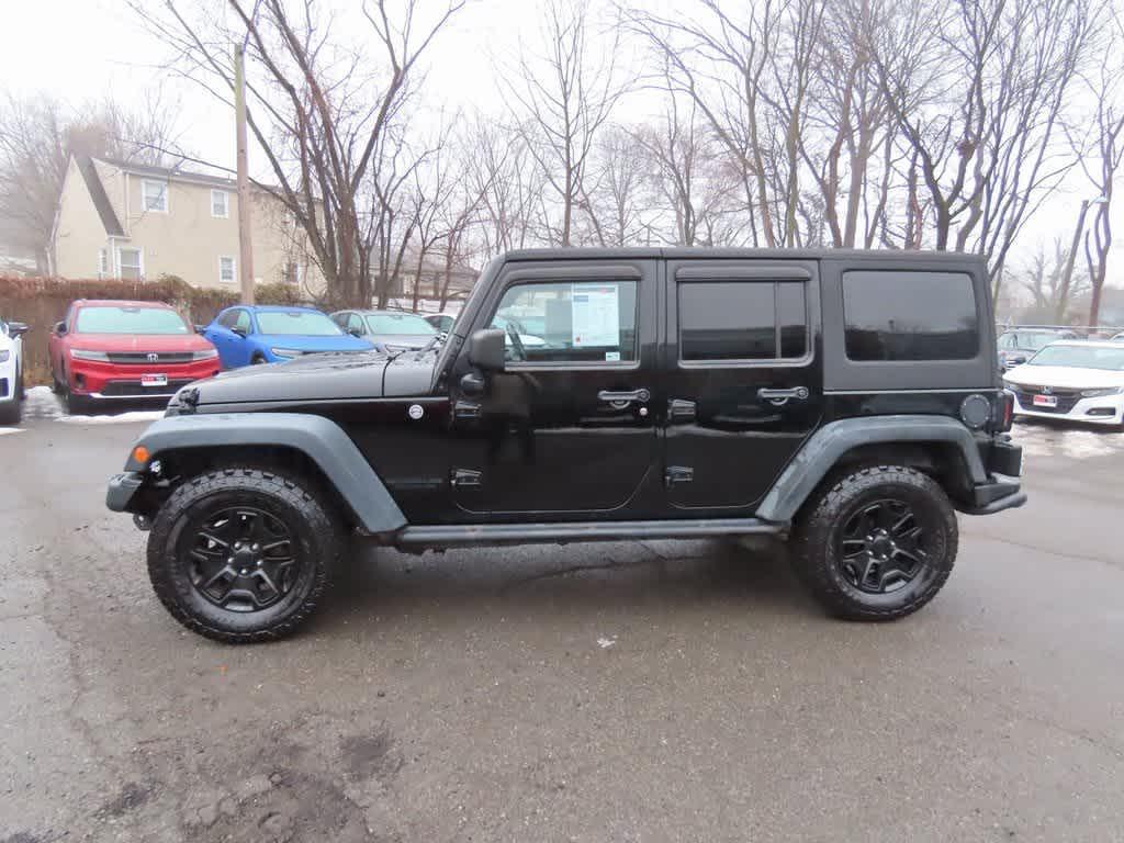 used 2013 Jeep Wrangler Unlimited car, priced at $12,995