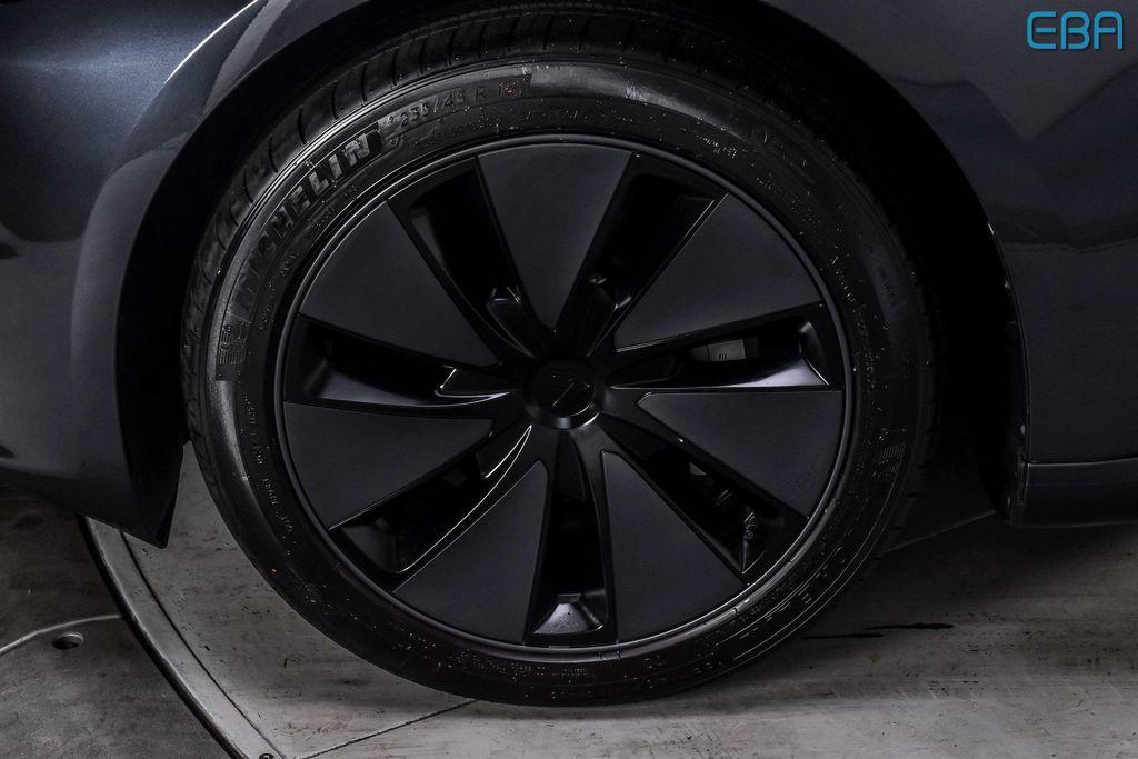 used 2025 Tesla Model 3 car, priced at $37,980