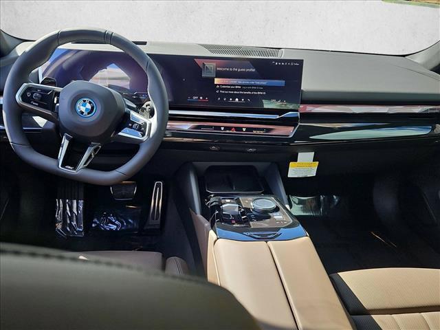 new 2027 BMW 550e car, priced at $88,663