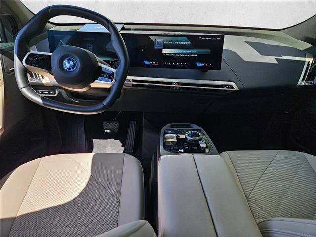 used 2025 BMW iX car, priced at $55,872