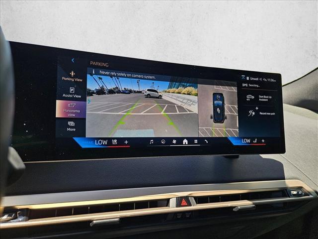 used 2025 BMW iX car, priced at $68,990