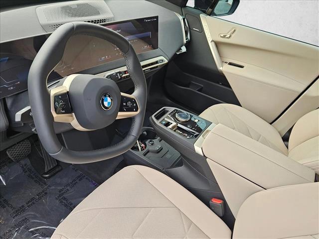 new 2026 BMW iX car, priced at $97,024