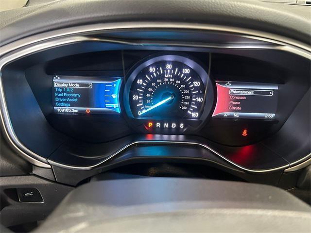 used 2015 Ford Fusion car, priced at $9,000