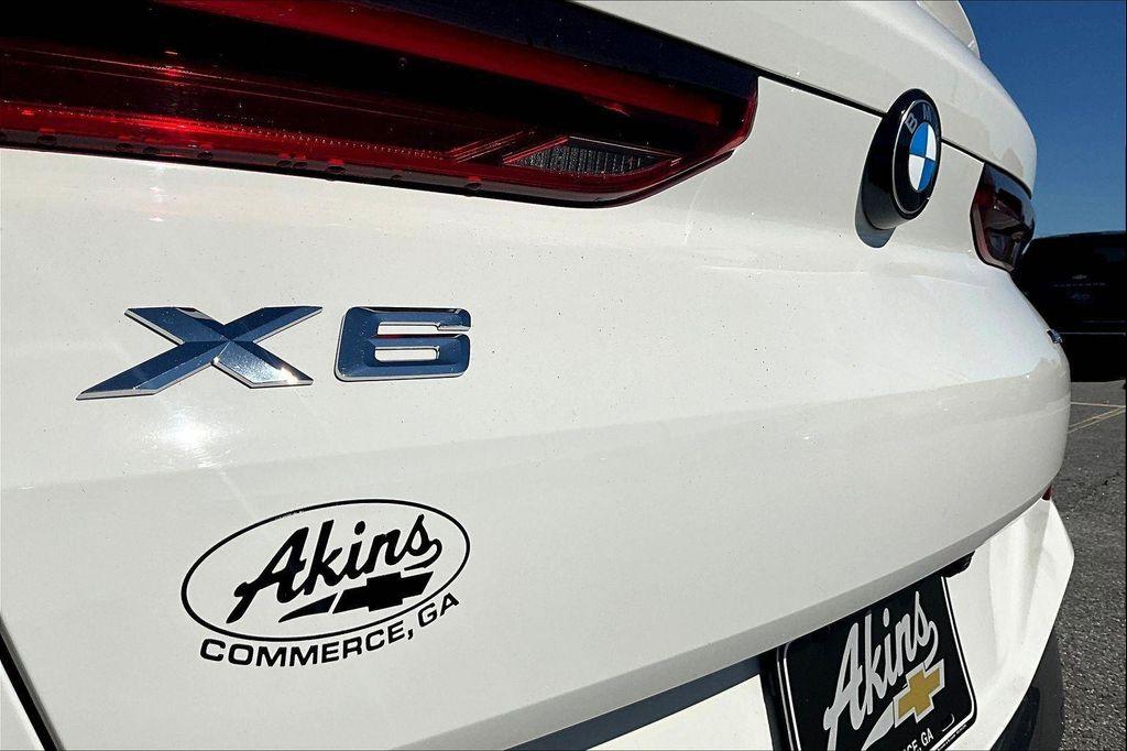 used 2023 BMW X6 car, priced at $44,291