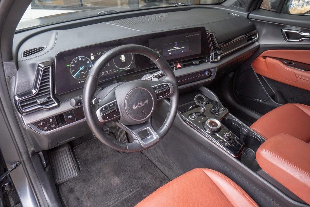 used 2023 Kia Sportage Hybrid car, priced at $27,623