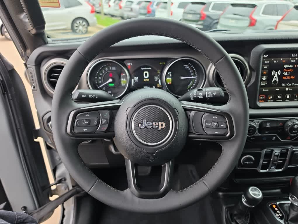 used 2023 Jeep Wrangler 4xe car, priced at $29,794