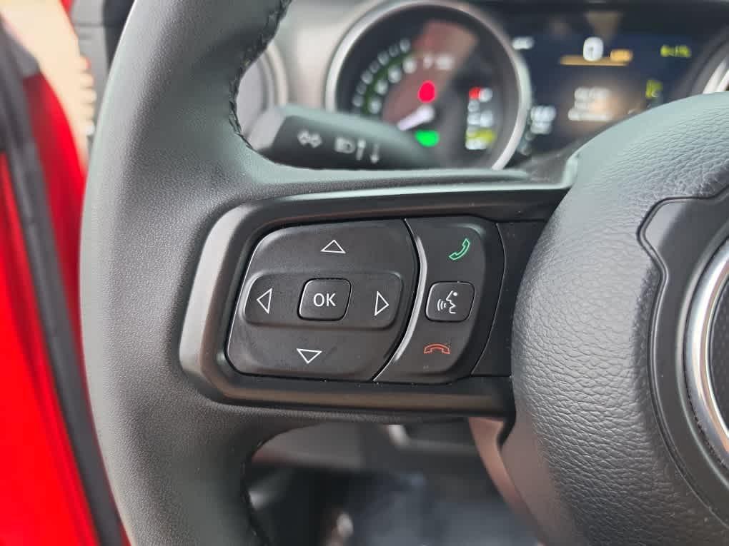 used 2023 Jeep Wrangler 4xe car, priced at $27,094