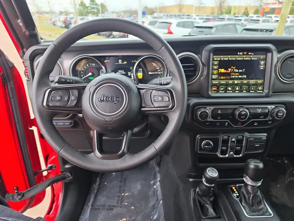 used 2023 Jeep Wrangler 4xe car, priced at $27,094