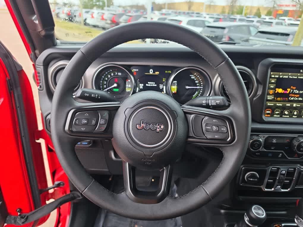 used 2023 Jeep Wrangler 4xe car, priced at $27,094