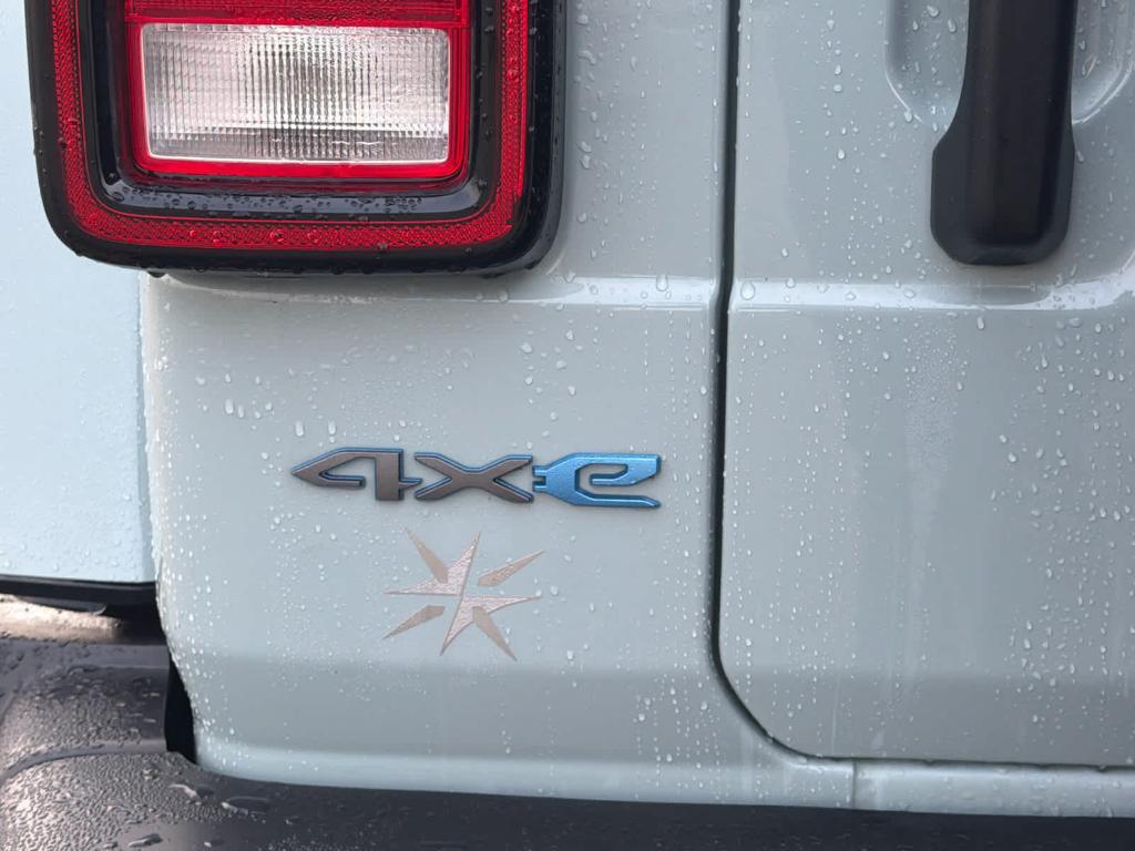 used 2024 Jeep Wrangler 4xe car, priced at $27,900