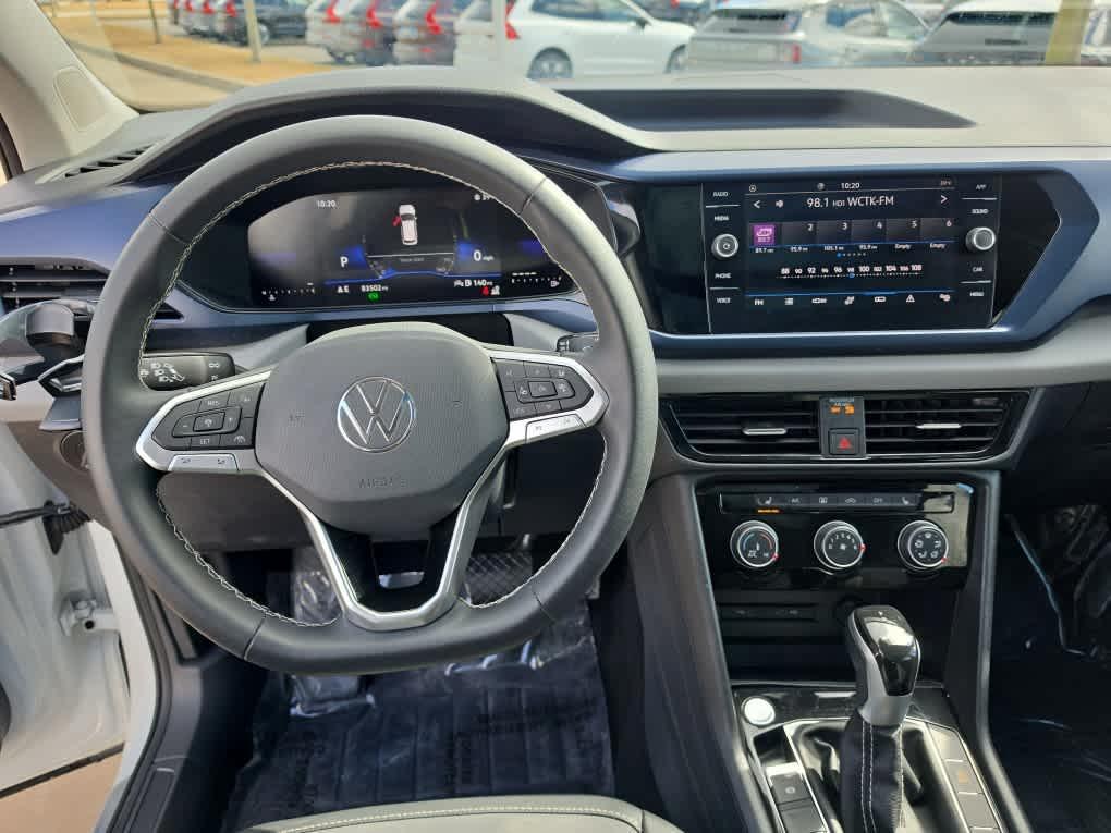 used 2023 Volkswagen Taos car, priced at $16,494