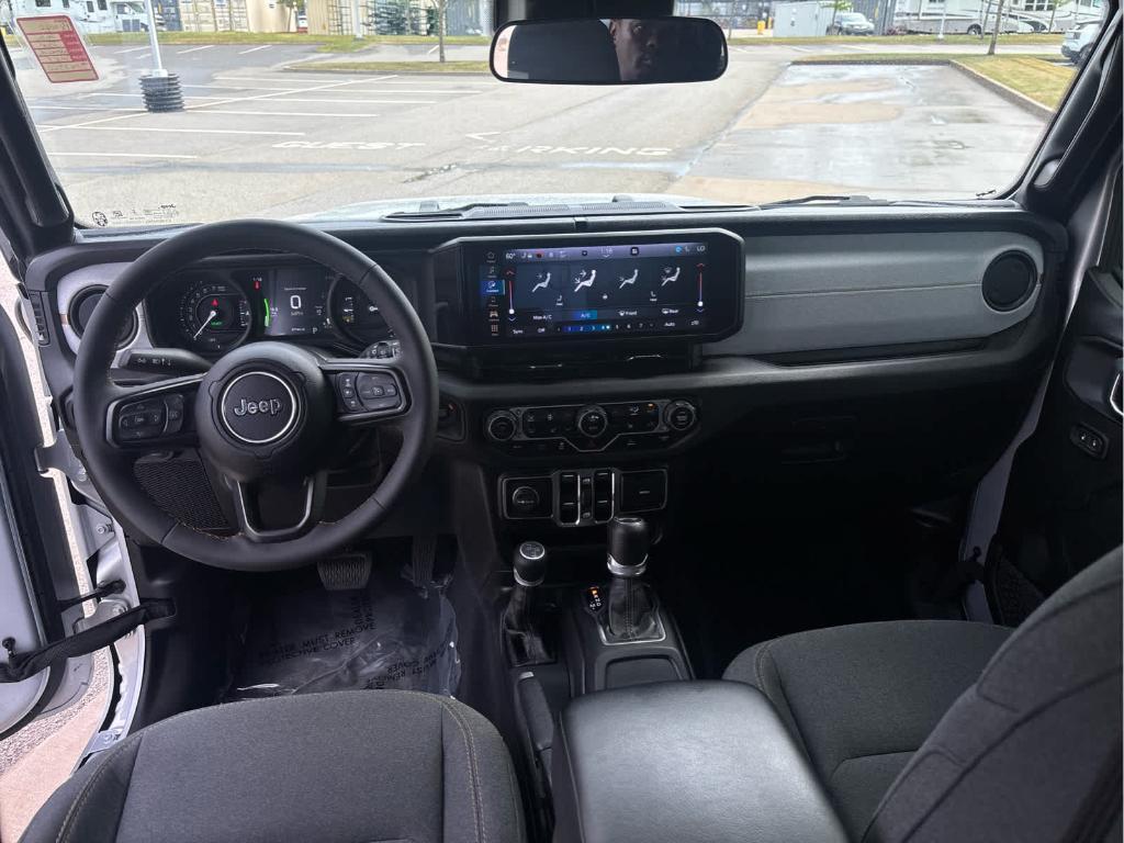 used 2024 Jeep Wrangler 4xe car, priced at $29,094