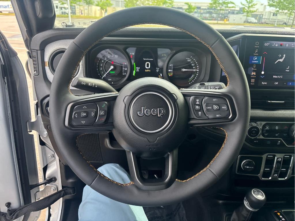 used 2024 Jeep Wrangler 4xe car, priced at $29,094