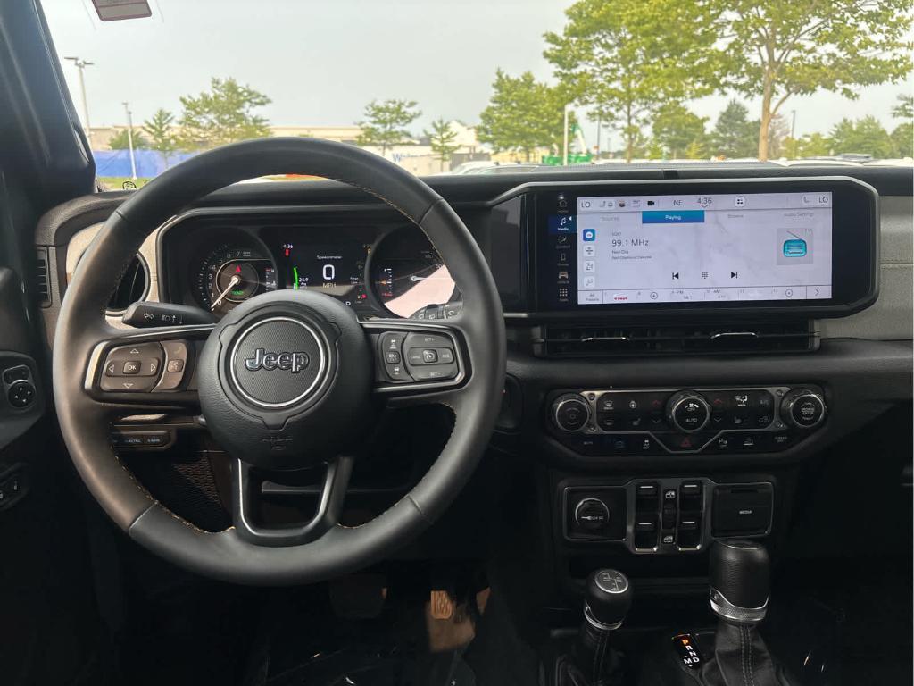 used 2024 Jeep Wrangler 4xe car, priced at $27,094