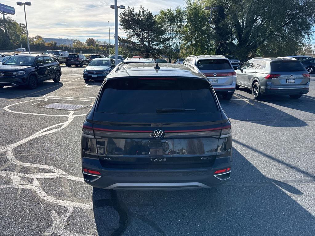 used 2025 Volkswagen Taos car, priced at $26,988