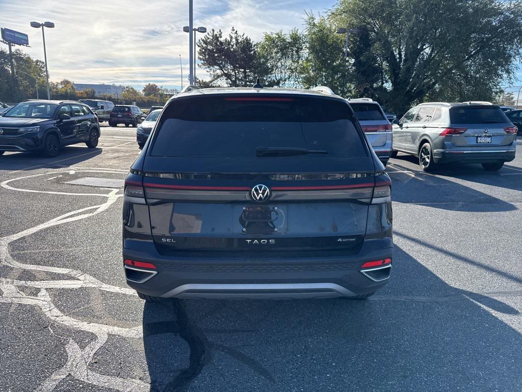 used 2025 Volkswagen Taos car, priced at $26,988