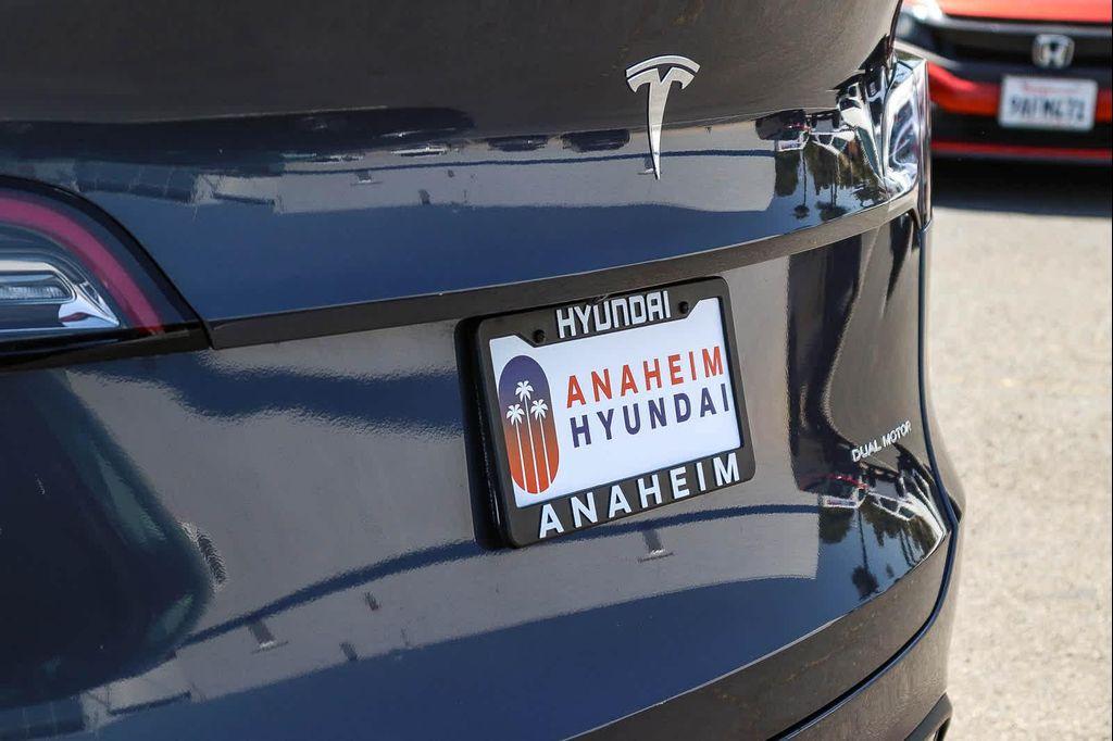 used 2023 Tesla Model Y car, priced at $34,677