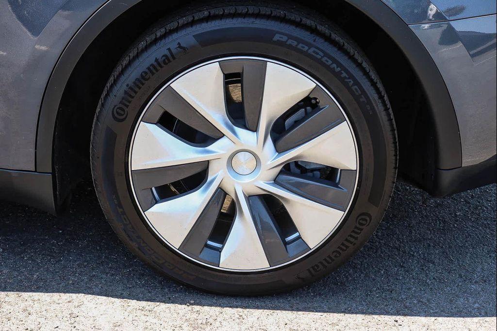 used 2023 Tesla Model Y car, priced at $34,677