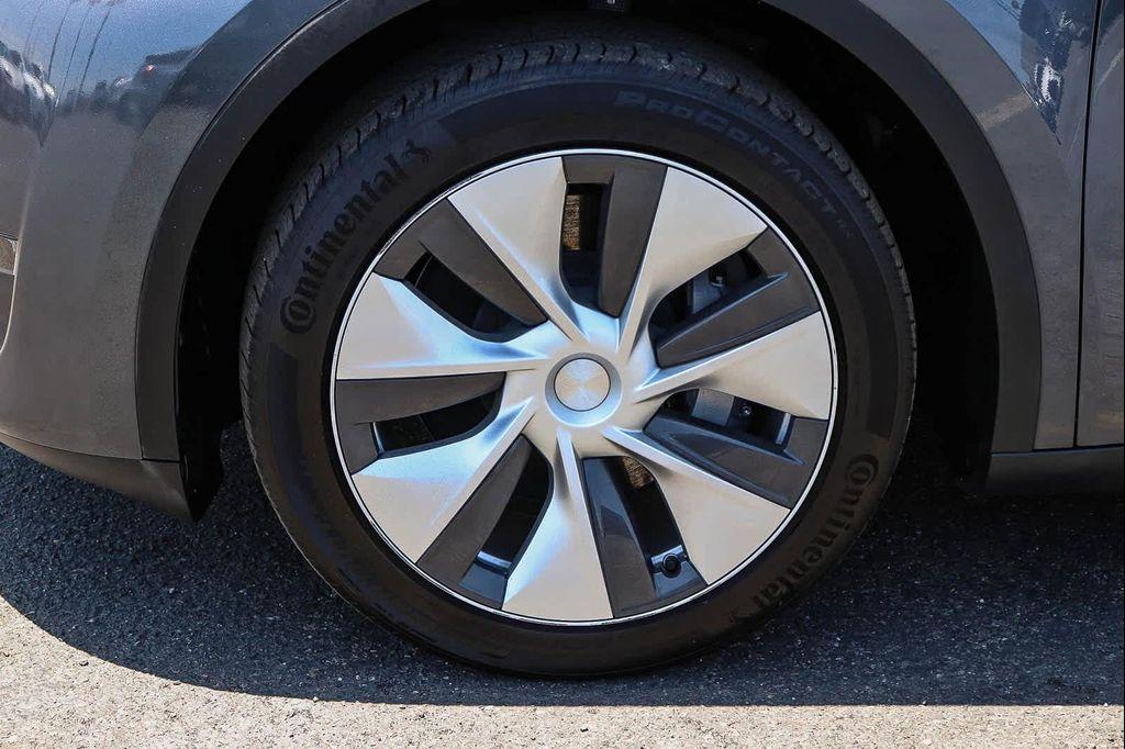 used 2023 Tesla Model Y car, priced at $34,677