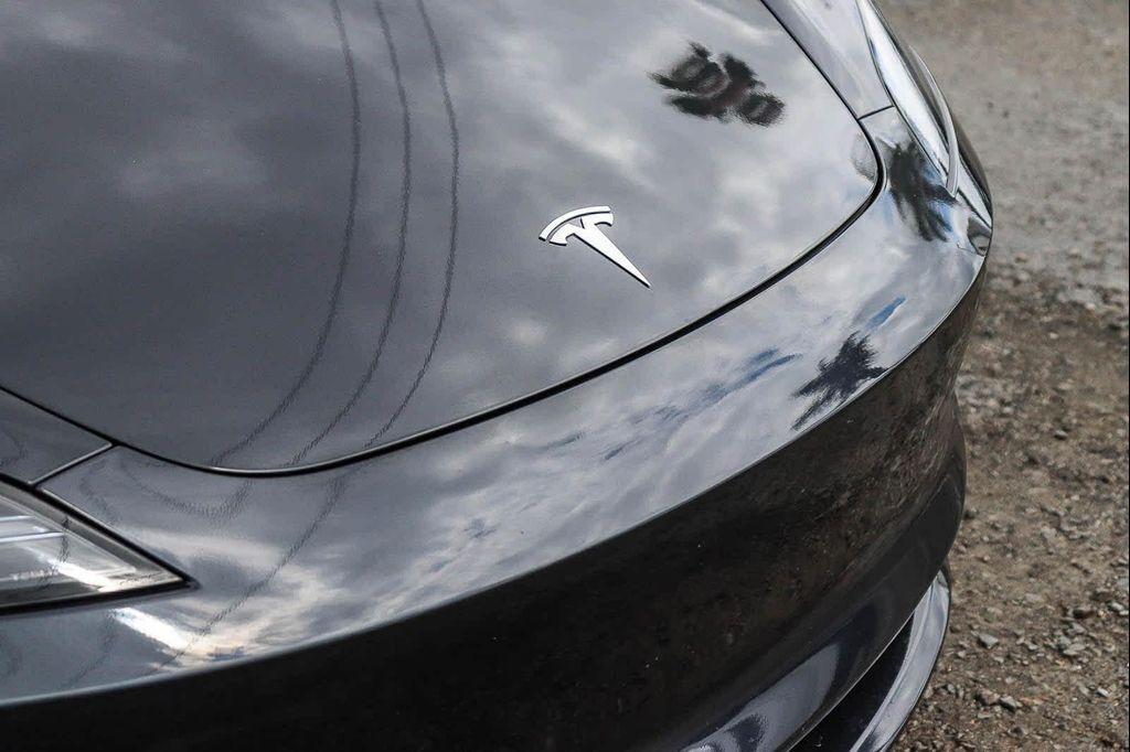 used 2024 Tesla Model 3 car, priced at $37,995