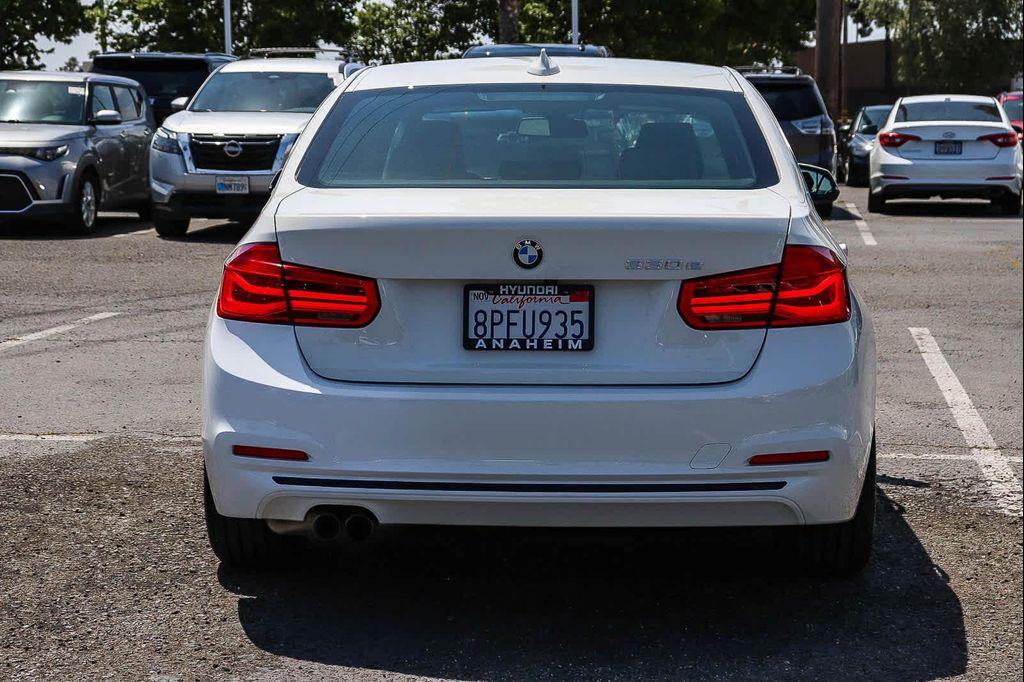 used 2018 BMW 330e car, priced at $19,995