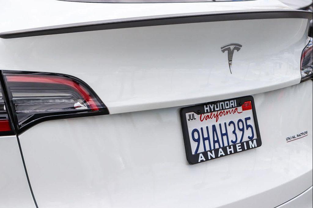 used 2023 Tesla Model Y car, priced at $33,995