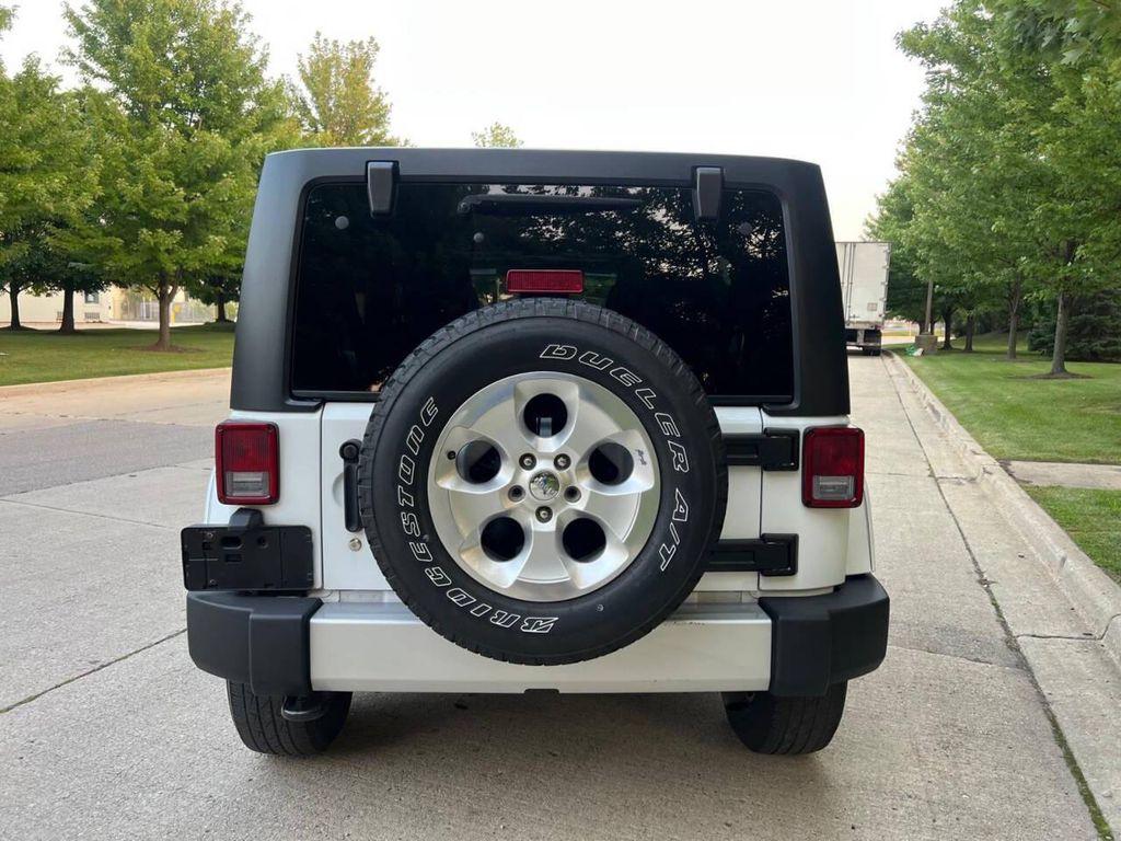 used 2013 Jeep Wrangler Unlimited car, priced at $9,997