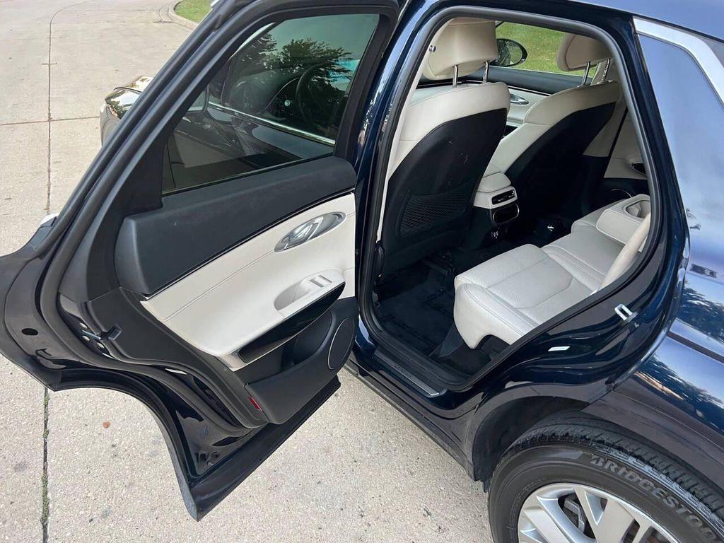 used 2023 Genesis GV70 car, priced at $26,997