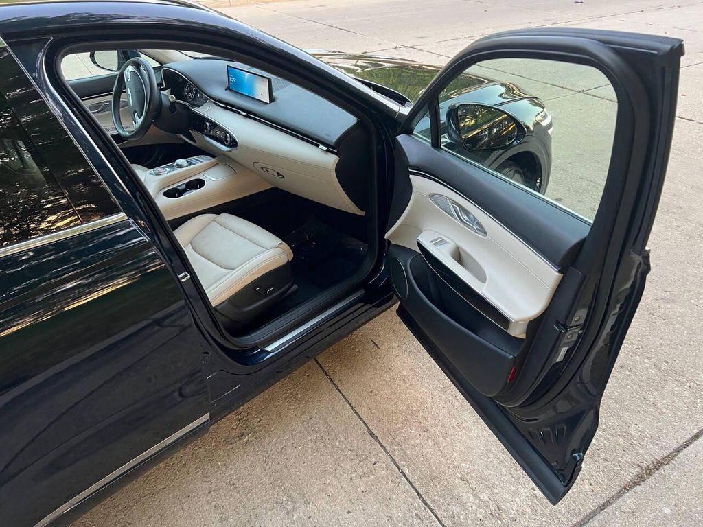 used 2023 Genesis GV70 car, priced at $26,997