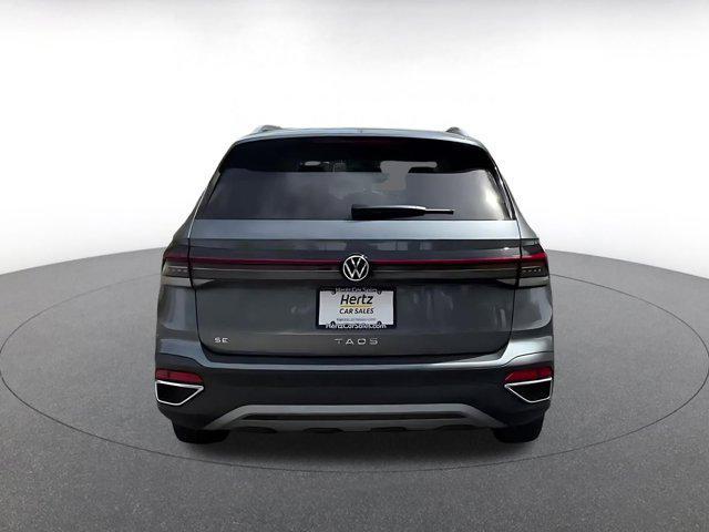 used 2025 Volkswagen Taos car, priced at $21,691