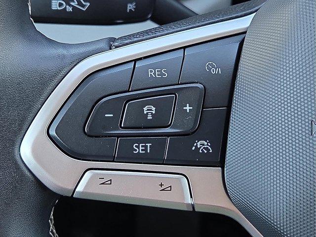 used 2024 Volkswagen Taos car, priced at $21,500