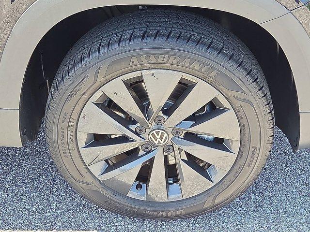 used 2023 Volkswagen Taos car, priced at $20,000