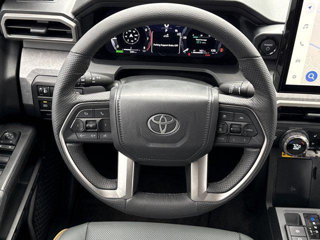 used 2025 Toyota Tacoma Hybrid car, priced at $56,040