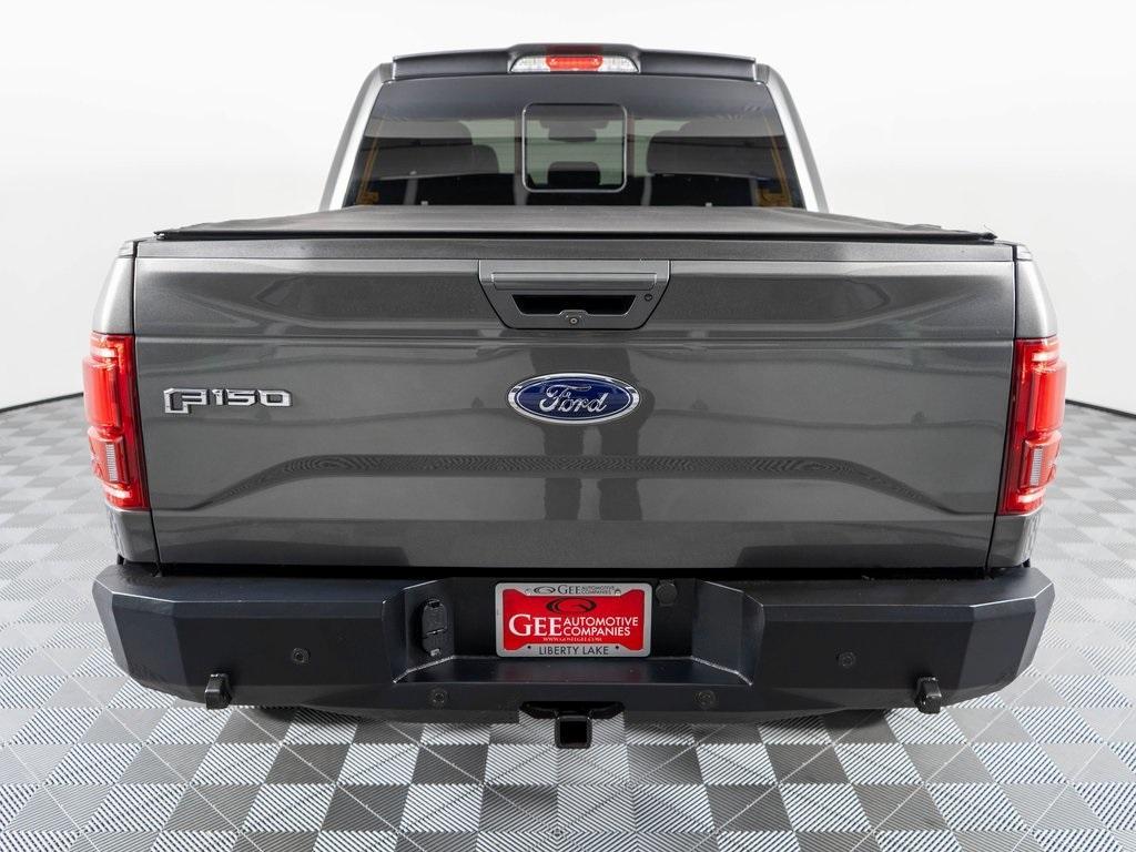 used 2015 Ford F-150 car, priced at $24,496