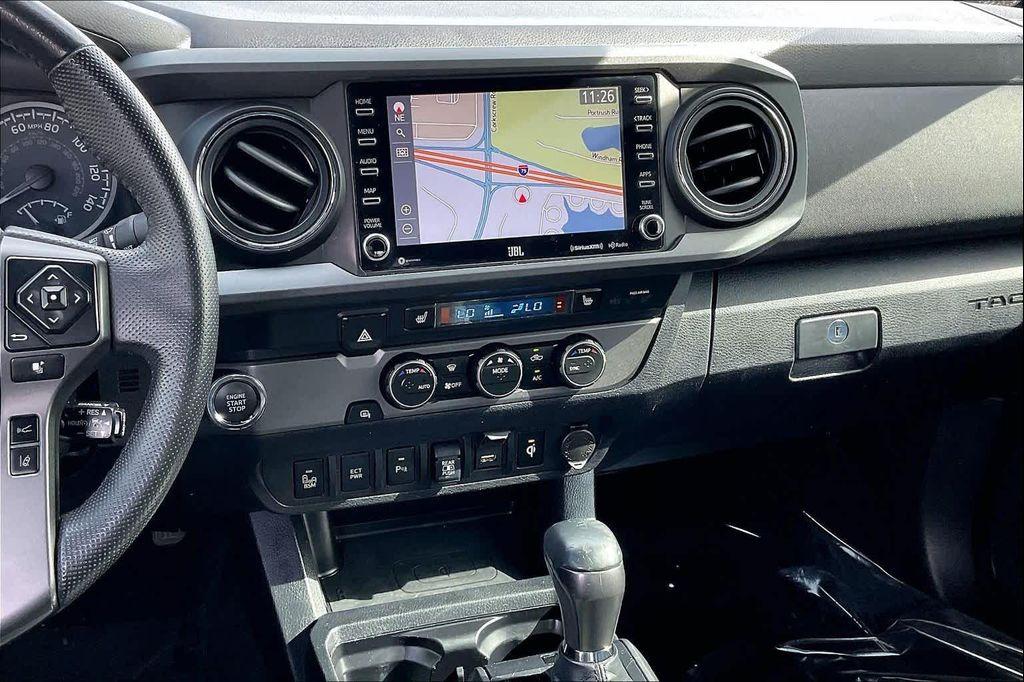 used 2020 Toyota Tacoma car, priced at $25,679