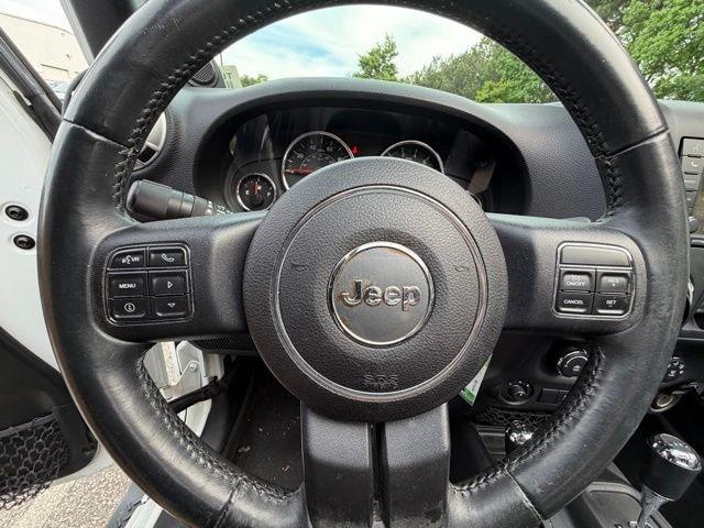 used 2014 Jeep Wrangler Unlimited car, priced at $21,198
