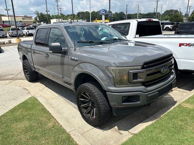 used 2018 Ford F-150 car, priced at $25,309