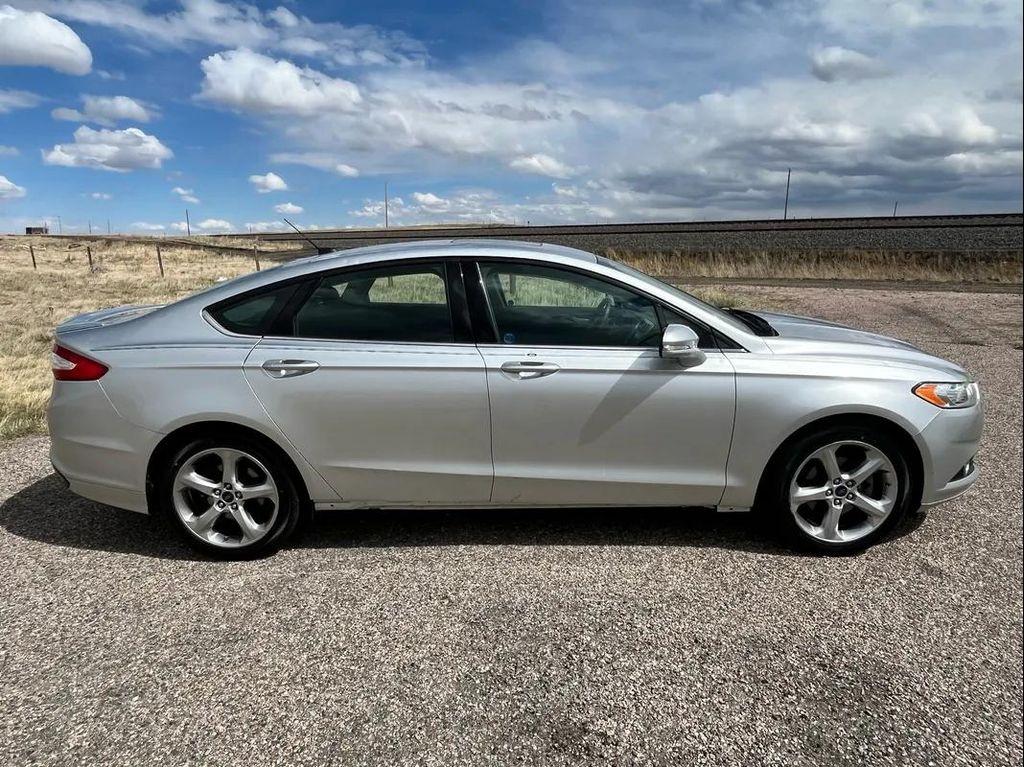 used 2014 Ford Fusion car, priced at $6,988