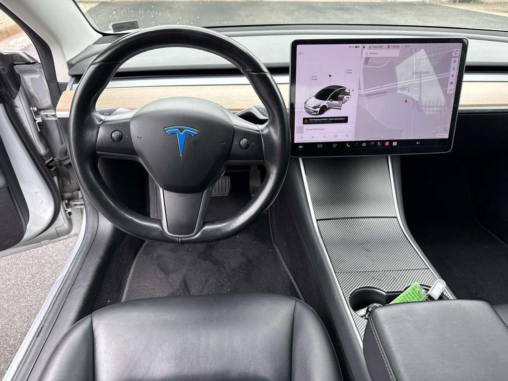 used 2018 Tesla Model 3 car, priced at $14,999