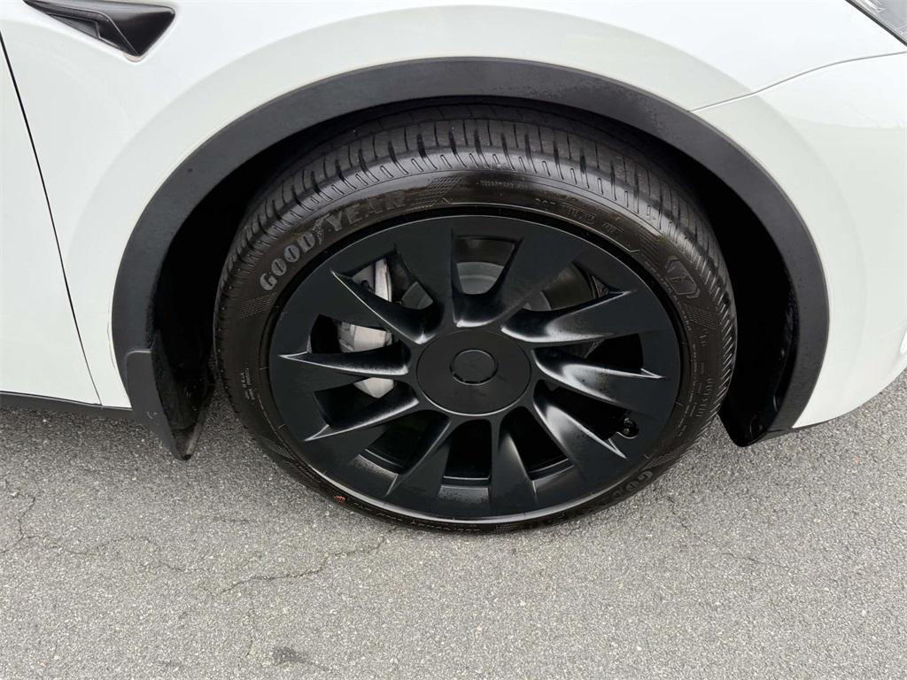 used 2023 Tesla Model Y car, priced at $33,000