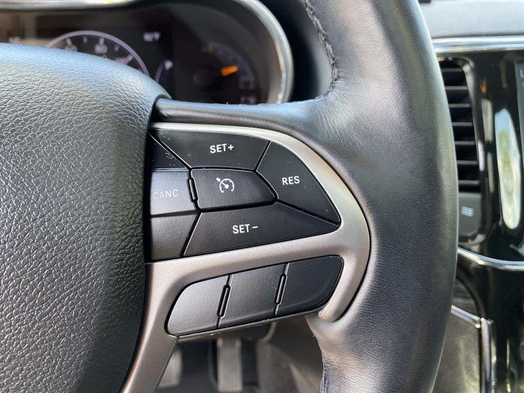 used 2022 Jeep Grand Cherokee car, priced at $29,556